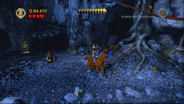 You need to get on a horse and move along the trail of coins - The of Caradhras - Collectibles - LEGO The Lord of the Rings - Game Guide and Walkthrough