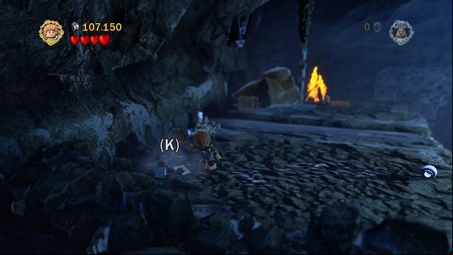 From where you fed the Troll, you have to move towards the camera, break the rocks and dig up the ground to pick up the treasure - The of Caradhras - Collectibles - LEGO The Lord of the Rings - Game Guide and Walkthrough