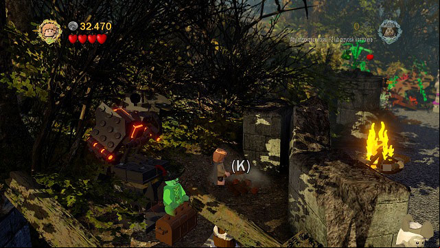 Open the age in the left part of the starting location using Shagrat's strength and you will be welcomed by a ghost - Amon Hen - p. 1 - Collectibles - LEGO The Lord of the Rings - Game Guide and Walkthrough