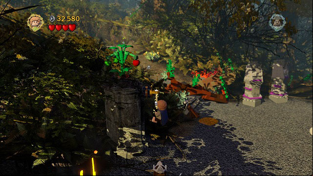 Tomatoes can be gathered by using the rope on the hook beside the bush and afterwards hitting the plant - Amon Hen - p. 1 - Collectibles - LEGO The Lord of the Rings - Game Guide and Walkthrough