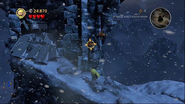 As you reach the bottom of the tower, on its outer wall on the right you should see some targets - Taming Gollum - Collectibles - LEGO The Lord of the Rings - Game Guide and Walkthrough