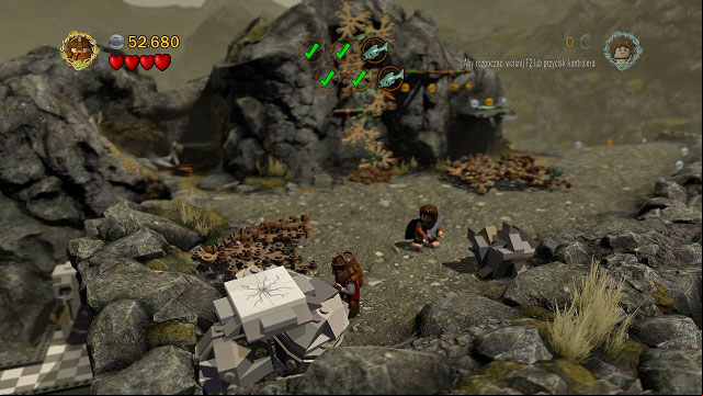 After jumping from the pillar onto the rock ledge, keep heading towards the camera - Taming Gollum - Collectibles - LEGO The Lord of the Rings - Game Guide and Walkthrough