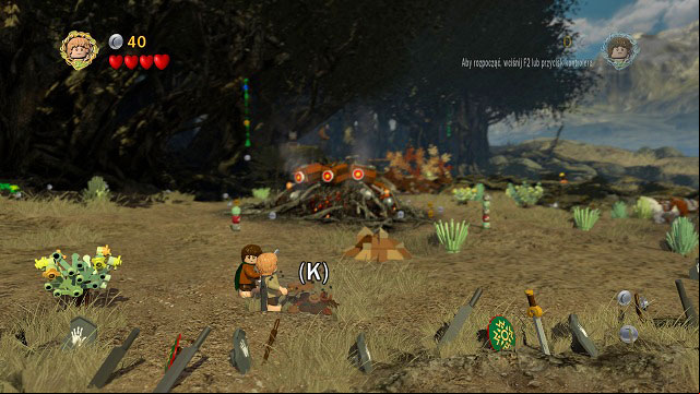 At the very beginning of the mission; head towards the camera and dig up the treasure from the ground - Track Hobbits - Collectibles - LEGO The Lord of the Rings - Game Guide and Walkthrough
