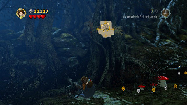 In the first section of the woods, throw Gimli at the cracked brick to receive the Minikit - Track Hobbits - Collectibles - LEGO The Lord of the Rings - Game Guide and Walkthrough
