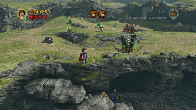 Head towards the camera and you should find a dark cave in the middle of the map, below the cliff - Warg Attack - Collectibles - LEGO The Lord of the Rings - Game Guide and Walkthrough