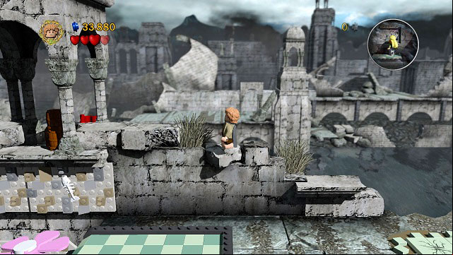 The flag can be found behind the barrels, to the left of your character. - Osgiliath - Collectibles - LEGO The Lord of the Rings - Game Guide and Walkthrough