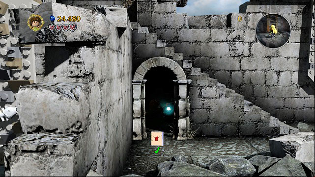 Right after freeing Gollum, below the stairs on the right you will find a dark room - Osgiliath - Collectibles - LEGO The Lord of the Rings - Game Guide and Walkthrough