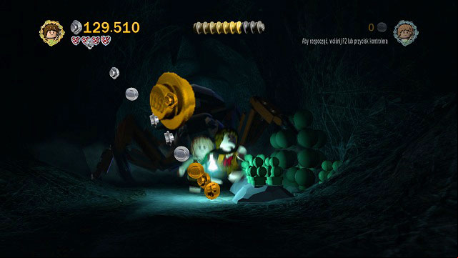 As you're running away from Shelob, you need to follow the trail of studs and break three piles of skulls (just do the following: go maximally to the right, to the left and back to the right side of the screen) - Secret Stairs - Collectibles - LEGO The Lord of the Rings - Game Guide and Walkthrough