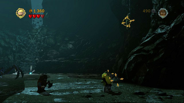 As you're fighting Shelob, you can find 5 cocoons hanging from the ceiling - Cirith Ungol - Collectibles - LEGO The Lord of the Rings - Game Guide and Walkthrough