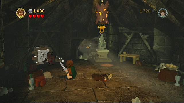 In the first location of the tower you have to destroy the cracked brick in the background and enter the breach in the wall - Cirith Ungol - Collectibles - LEGO The Lord of the Rings - Game Guide and Walkthrough