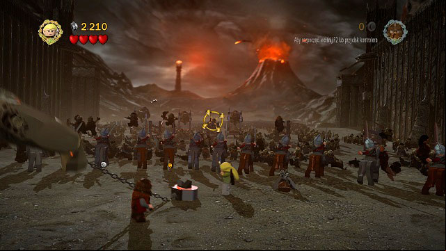 In the background of the arena you will find 5 towers with Orc archers - you need to hit them all to receive the Minikit - The Black Gate - Collectibles - LEGO The Lord of the Rings - Game Guide and Walkthrough