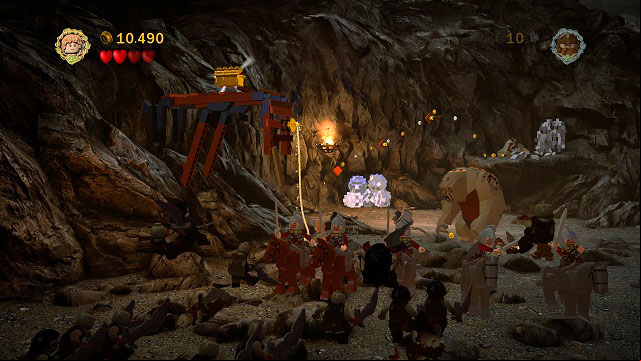 When the fight once again move to the left of the gate, you will have to head to the very edge of the arena and use the rope on the hook there - The Black Gate - Collectibles - LEGO The Lord of the Rings - Game Guide and Walkthrough
