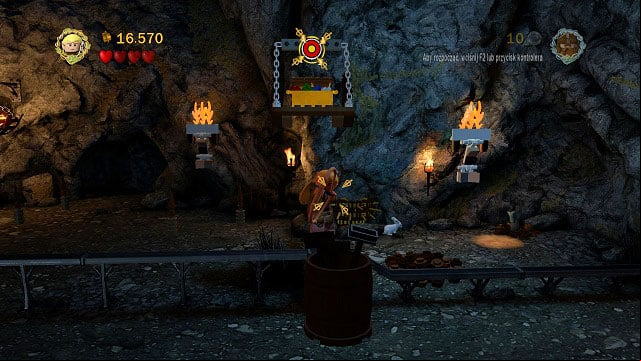 In the same location as Minikit #5; you need to shoot the target above you - The Black Gate - Collectibles - LEGO The Lord of the Rings - Game Guide and Walkthrough