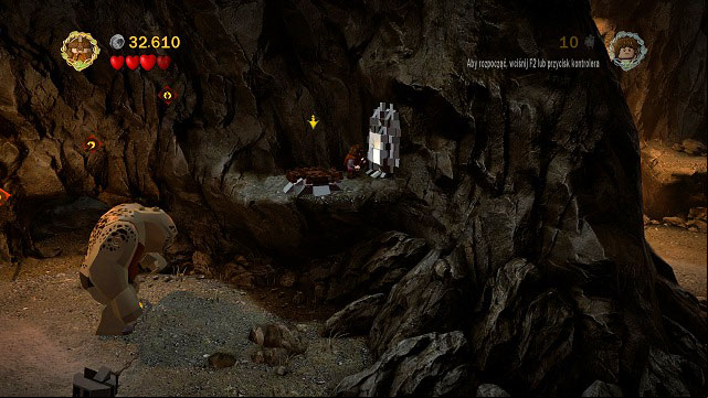 During the second fight to the left of the gate you have to get onto the rock ledge with Legolas, change to Gimli and break the cracked tile with Gimli - The Black Gate - Collectibles - LEGO The Lord of the Rings - Game Guide and Walkthrough