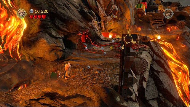 After stopping the river of lave, dig up another stone from the loose ground beneath you and throw it at the pillar on the right - Mount Doom - Collectibles - LEGO The Lord of the Rings - Game Guide and Walkthrough
