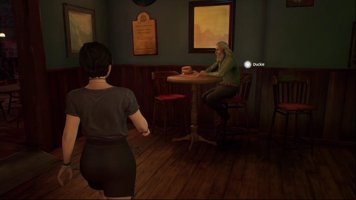 Duckie's sitting alone in the bar - Life is Strange True Colors: Outside the festival - walkthrough - Chapter 4 Flicker - Life is Strange True Colors Guide