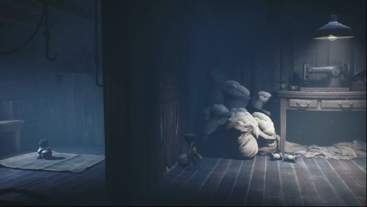 Move to the wall on the left and you will see Six sitting on the carpet - Little Nightmares 2: A Cottage in the Forest - Chapter 1 walkthrough - Chapter 1 - Forest - Little Nightmares 2 Guide
