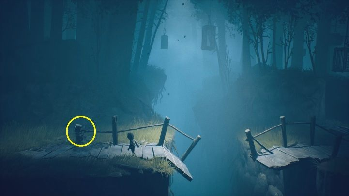 You must pull the string to lift a section of the bridge, which will allow Six to jump to the other side - Little Nightmares 2: Escaping the Hunter - Chapter 1 walkthrough - Chapter 1 - Forest - Little Nightmares 2 Guide