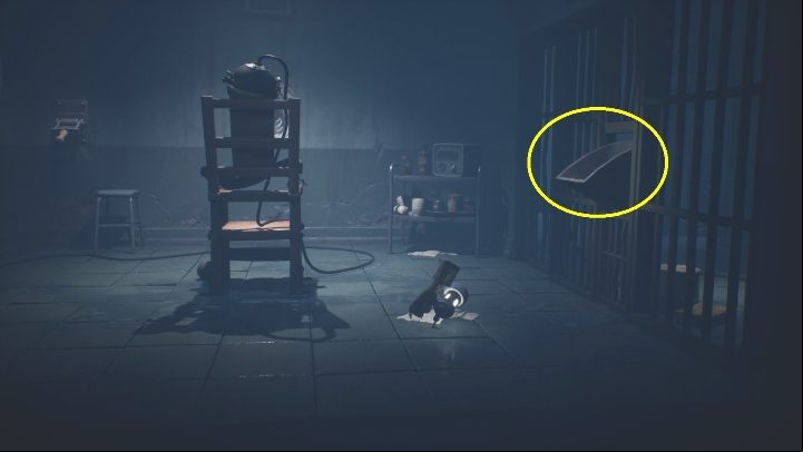 Throw the fuse at the metal part so Six can get it on the other side - Little Nightmares 2: Fuses - Chapter 3 Hospital walkthrough - Chapter 3 - Hospital - Little Nightmares 2 Guide