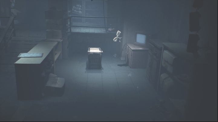 Then pull the cart to the TV and jump up on the shelf so you can move again - Little Nightmares 2: Shop and Escape - Chapter 4 walkthrough - Chapter 4 - Getting to the Tower - Little Nightmares 2 Guide