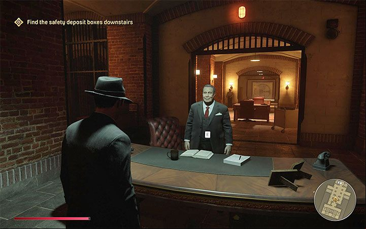 After regaining control of Tommy, he will be standing at the entrance of the Grand Imperial Bank - Mafia Definitive Edition: Omerta - walkthrough - Walkthrough - Mafia Definitive Edition Guide, Walkthrough