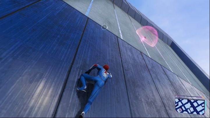 Look for this Spider-bot on one of the walls of the skyscraper - Spider-Man 2: All Spider-bot locations - Secrets and Collectibles - Spider Man 2 Guide