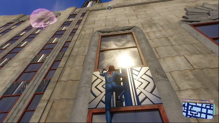 This Spider-bot is found at the very top of Empire State Building - Spider-Man 2: All Spider-bot locations - Secrets and Collectibles - Spider Man 2 Guide