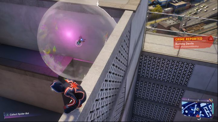 Look for this Spider-bot on the rooftop of the marked building - Spider-Man 2: All Spider-bot locations - Secrets and Collectibles - Spider Man 2 Guide