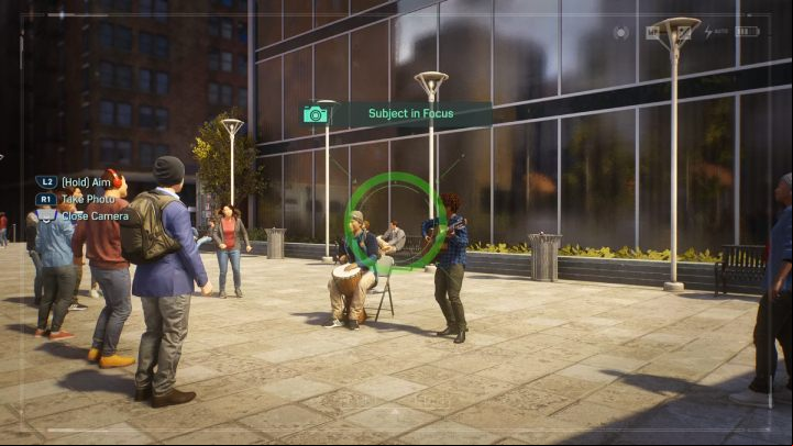 Take a photo of the couple playing in front of the building in the eastern part of Hell's Kitchen - Spider-Man 2: All Photo Ops - locations - Secrets and Collectibles - Spider Man 2 Guide