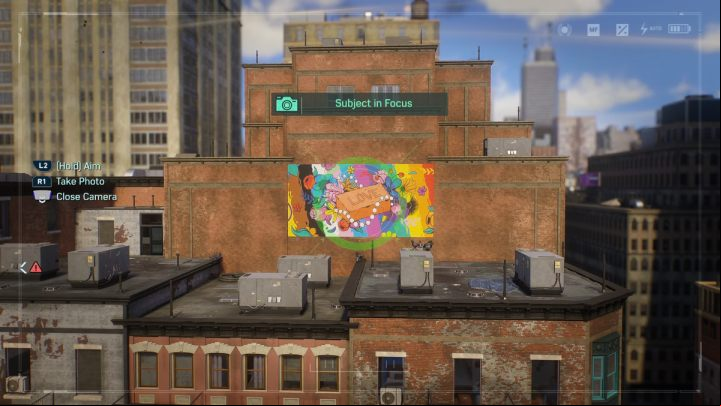 Take a photo of the mural on the roof of the building in the northern part of Greenwich - Spider-Man 2: All Photo Ops - locations - Secrets and Collectibles - Spider Man 2 Guide