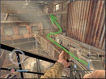Once you've reached a destroyed section of the platform, turn left (screen) - Sabotage Tank Factory Control Room - part 2 - Operation Varsity - Medal of Honor: Airborne - Game Guide and Walkthrough