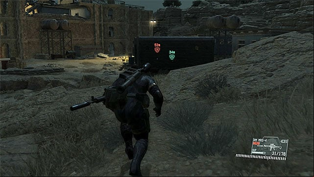 The cage with the prisoner. - Extracting the prisoners and enemy patrol | Walkthrough - Mission 9 - Backup, Back Down - Metal Gear Solid V: The Phantom Pain Game Guide & Walkthrough