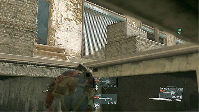 The door to the building with the prisoners - Remaining Angel With Broken Wings - secondary mission objectives | Walkthrough - Mission 10 - Angel With Broken Wings - Metal Gear Solid V: The Phantom Pain Game Guide & Walkthrough