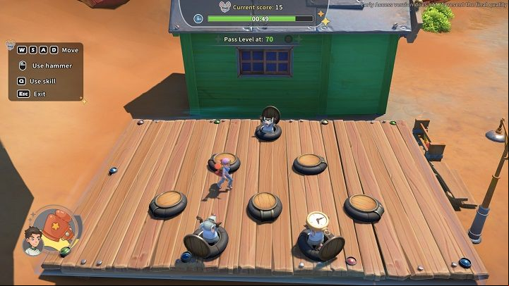 To play Whack-a-mole, approach the hammers standing next to the building - My Time at Sandrock: Game Center - Basics - My Time at Sandrock Guide, Walkthrough