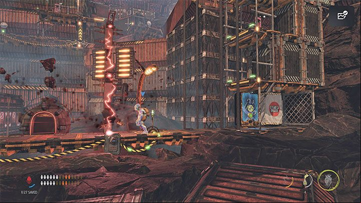 On the upper level, you have to watch out for a new machine with a big smile - Oddworld Soulstorm: Crossing The Gantry Channel, The Yards - walkthrough - 15: The Yards - Oddworld Soulstorm Guide
