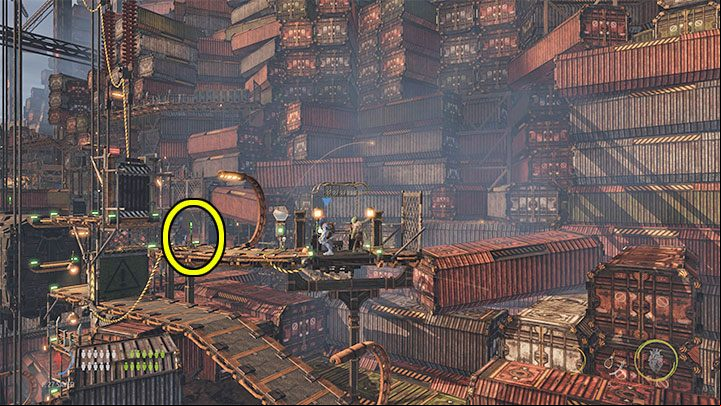 The lower level is patrolled by another big smile machine - Oddworld Soulstorm: Crossing The Gantry Channel, The Yards - walkthrough - 15: The Yards - Oddworld Soulstorm Guide