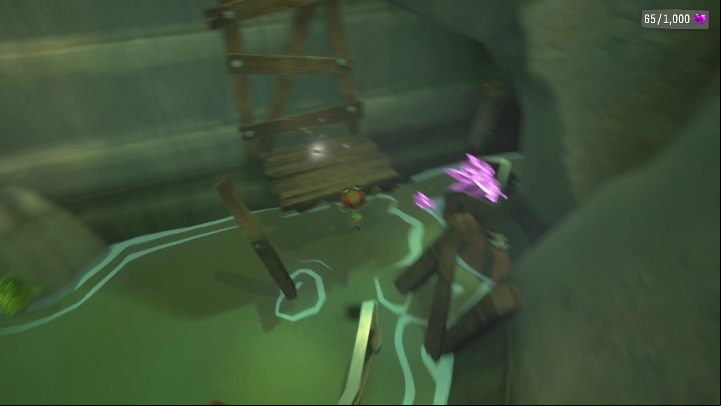 Before entering the abandoned cave, you need to jump down to one of the lower rocks, then onto a metal railing - Psychonauts 2: PSI Challenge Card, The Quarry - where to find? - The Quarry - Psychonauts 2 Guide