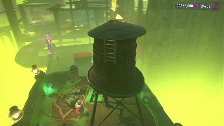 To get to this secret, you have to jump off the neon sign next to the building - Psychonauts 2: Nuggets of Wisdom, Strike City - where to find? - Strike City - Psychonauts 2 Guide