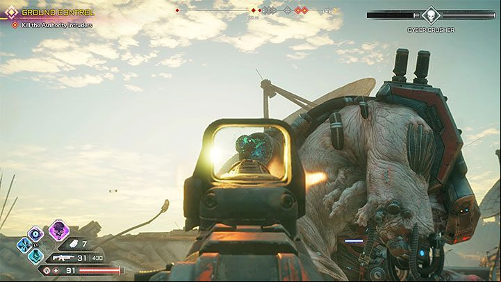In the second phase, you have to run towards the stunned boss and attack the blue tanks on his back - Cyber Crusher | Boss in Rage 2 - Bosses - Rage 2 Guide