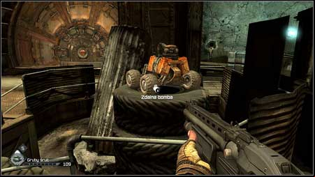 Once the area is clear, pick up the RC Bomb lying on tires and then keep going to the left - Destroy the Bomb Caches - p. 1 | Main missions - Main missions - Rage Game Guide & Walkthrough