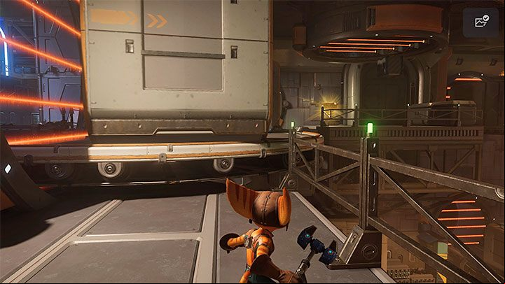 In order to reach the bolt, you must run across the upper transmission belts - Ratchet & Clank Rift Apart: Nefarious City - collectibles, list of all, map - Secrets and Collectibles - Ratchet & Clank Rift Apart Guide