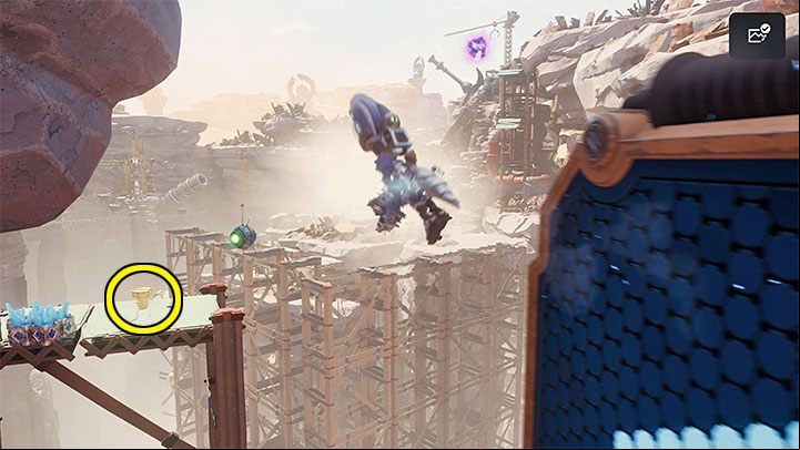 At the end, you have to launch yourself, grab the hook mid-flight, swing on it and land on the platform with the secret - Ratchet & Clank Rift Apart: Torren IV - collectibles, list of all, map - Secrets and Collectibles - Ratchet & Clank Rift Apart Guide