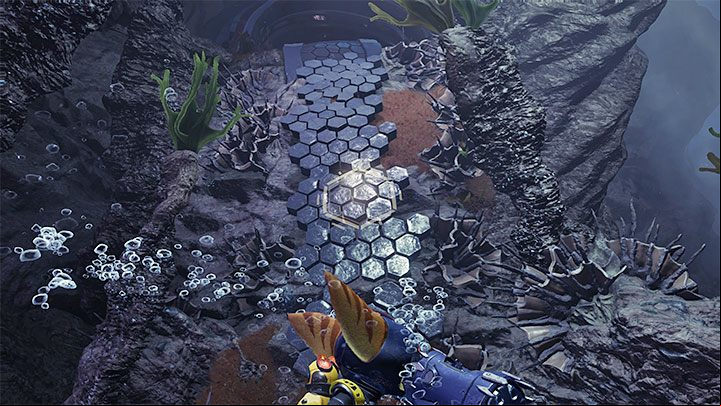 You can find the secret in the Underground - Hot Planet section, specifically while using the Magneboots to travel through the sea depths in the northwestern part of the map - Ratchet & Clank Rift Apart: Cordelion - list of all collectibles, map - Secrets and Collectibles - Ratchet & Clank Rift Apart Guide