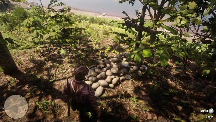The grave is in the grass, near the river - Red Dead Redemption 2: Graves - maps, locations, tips - Secrets and collectibles - Red Dead Redemption 2 Guide