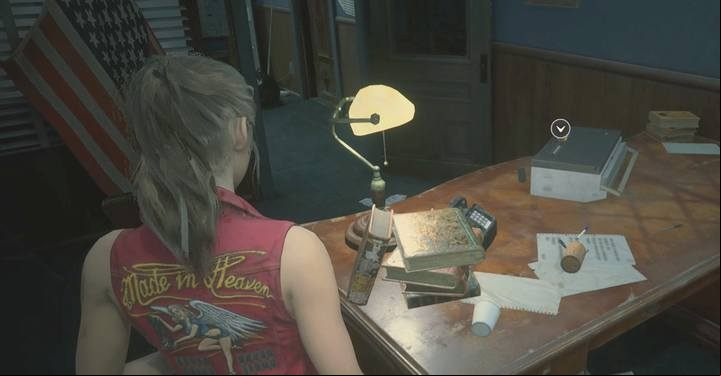 A 9V battery. - Collect 3 medallions task | Police station in Resident Evil 2 - Walkthrough - Resident Evil 2 Guide