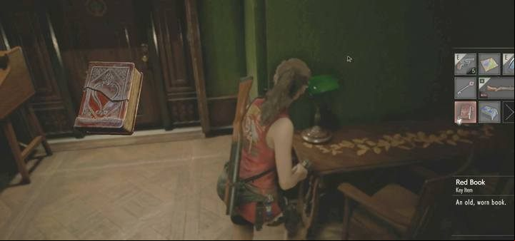 First go to the Library, 2F. At the door leading to the main hall you will find a red book on the table. - How to get the third weapon from the Armory? - Secrets and useful items - Resident Evil 2 Guide