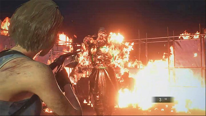 After the fuel tank is destroyed, you advance to the second phase of the fight - you must attack and avoid the burning Nemesis - Resident Evil 3: Demolition site walkthrough - Story walkthrough - Resident Evil 3 Guide