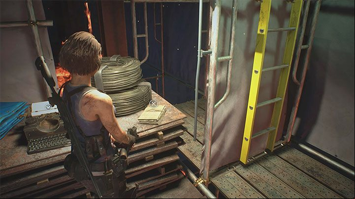 The note is located on one of the higher scaffolds of the burning Demolition Site building - Resident Evil 3: Demolition Site secrets, collectibles - Collectibles and secrets - Resident Evil 3 Guide