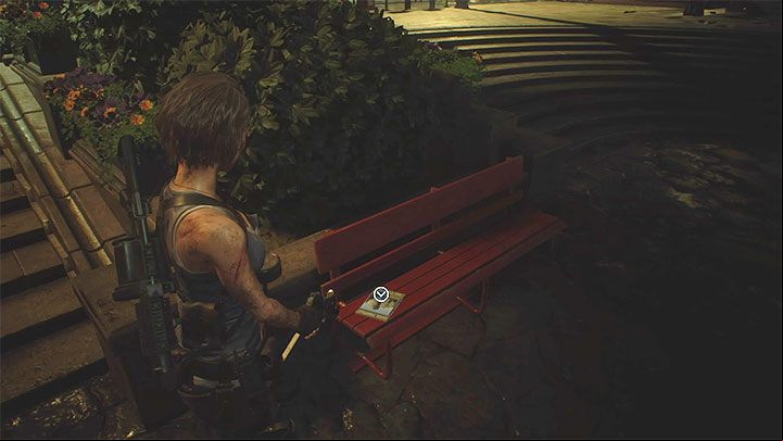 The brochure is located on a red bench near the river and the starting point of the Clock Tower Plaza area - Resident Evil 3: Clock Tower Plaza secrets, collectibles - Collectibles and secrets - Resident Evil 3 Guide