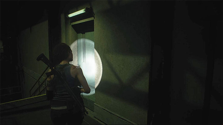 When you return to the steps, take an interest in the green door shown in the picture - Resident Evil 3: Warehouse fuses puzzle - Puzzle Solutions - Resident Evil 3 Guide